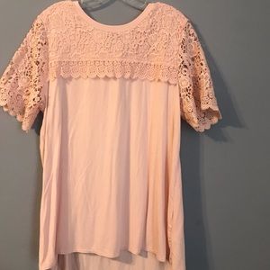 Light pink blouse with short sleeves. Never used.